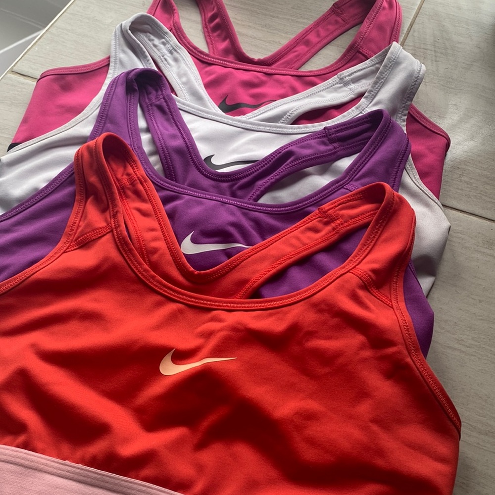 4 Nike sports bras GUC